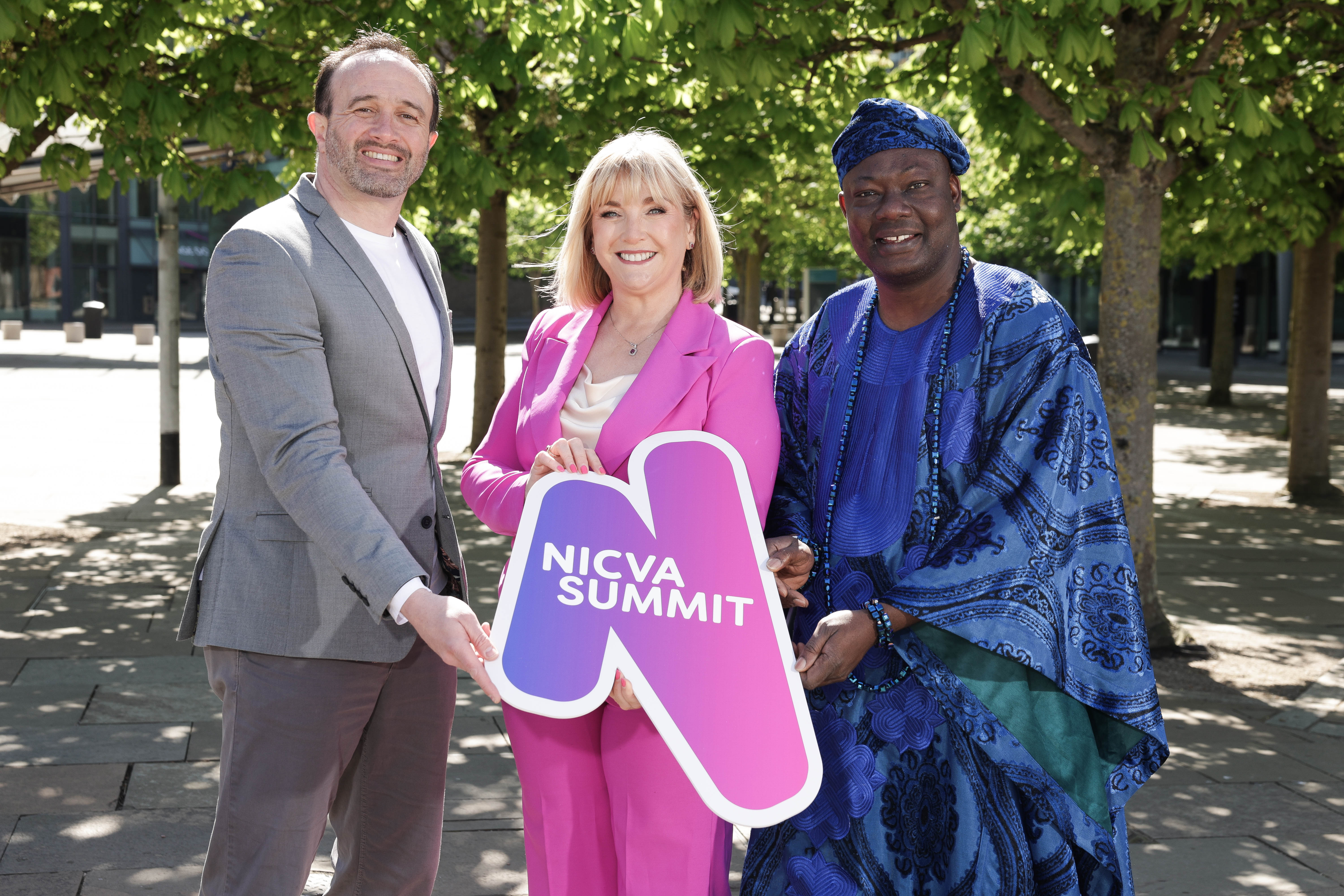 Stephen Dallas, CEO of Bytes Project and NICVA Chair, Celine McStravick, NICVA CEO and Jahswil Emmanuel BEM, founder and CEO of Multi-Ethnic Sports and Cultures NI (MSCNI) and member of the NICVA Executive Committee pictured launching the 2026 NICVA SUMMIT. 