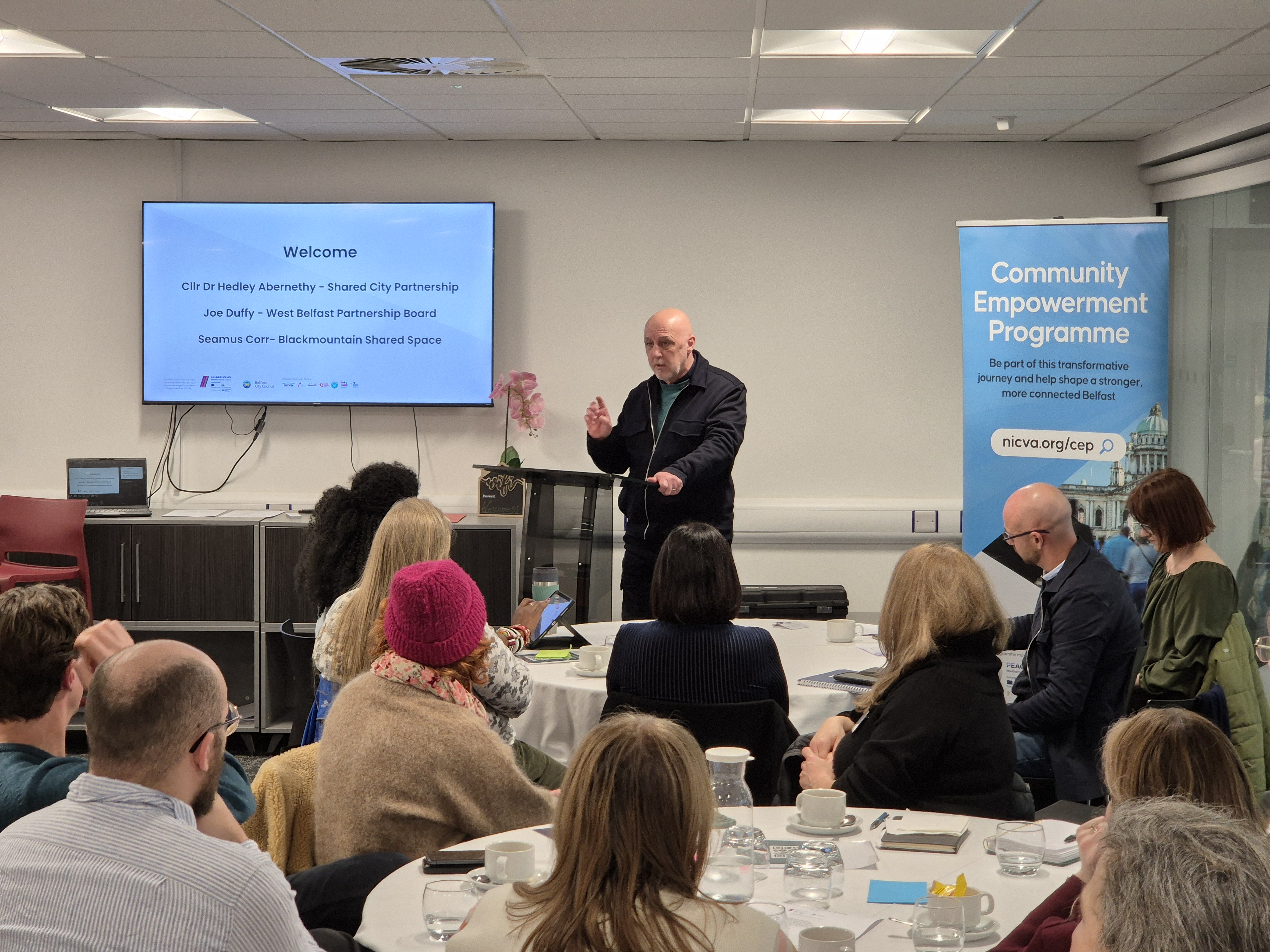 Cllr Dr Hedley Abernethy representing Shared City Partnership opening the CEP event