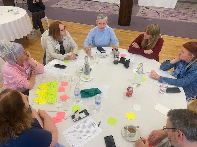 A roundtable discussion of volunteers at the event