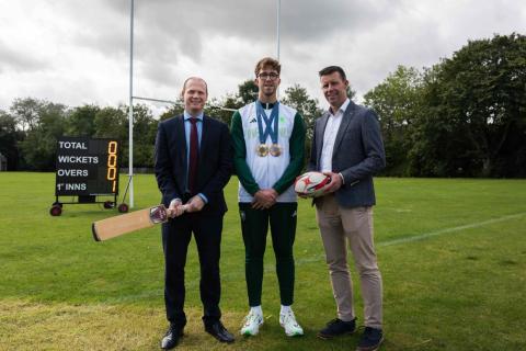 Communities Minister Gordon Lyons pictured with Olympic Champion Daniel Wiffen and Richard Archibald, Interim CEO of Sport NI at the launch of the Olympic Legacy Fund.