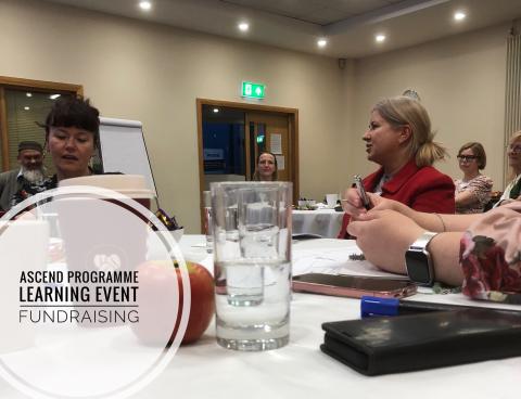 table with people at ASCEND learning event