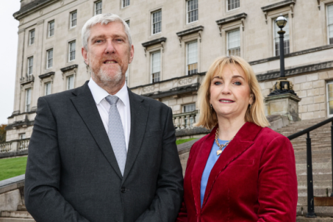 Finance Minister John O’Dowd pictured with Celine McStravick, Chief Executive of NICVA.