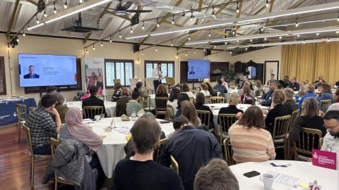 Room full of people at the AI Funder Conference 