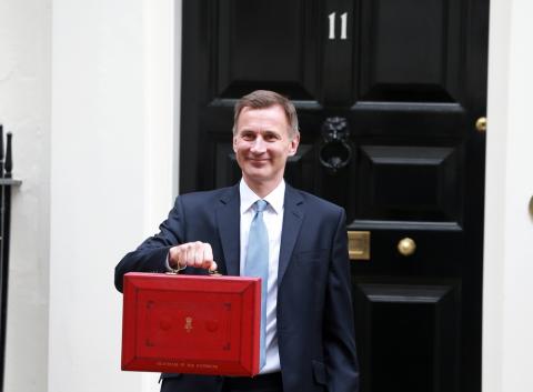 Jeremy Hunt leaves Downing Street with the despatch box to present his spring budget to parliament